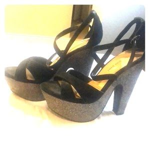 Black and silver wedge heels